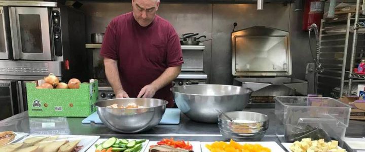 Jonathan Zissman prepping in the Karme Choling Kitchen.