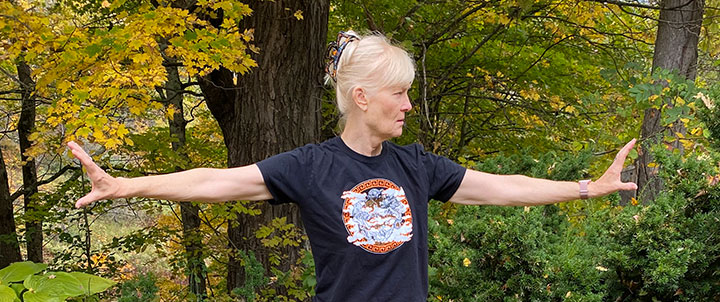 Qigong exercise shown by teacher